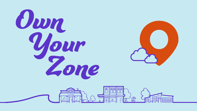 A location marker floating over a city about to get hit by a tsunami wave, with the text &quot;Own your zone&quot; above